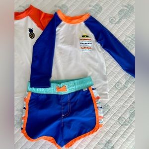 EUC Cat & Jack swim set. Two rash guards, one swim short